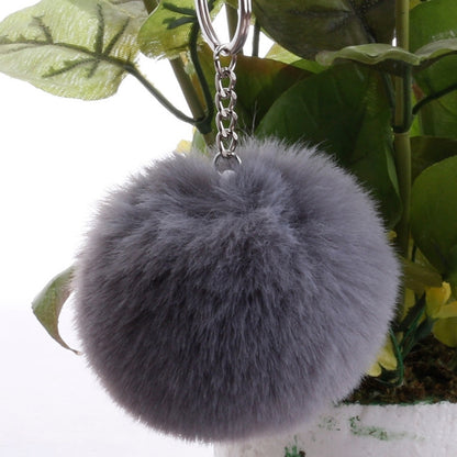Gray faux rabbit fur pompon keychain with silver metal key ring and chain