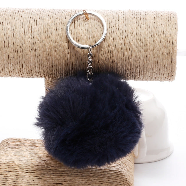 Dark navy faux rabbit fur pompon keychain with silver key ring and chain