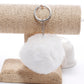 White faux rabbit fur pompon keychain with silver key ring and chain