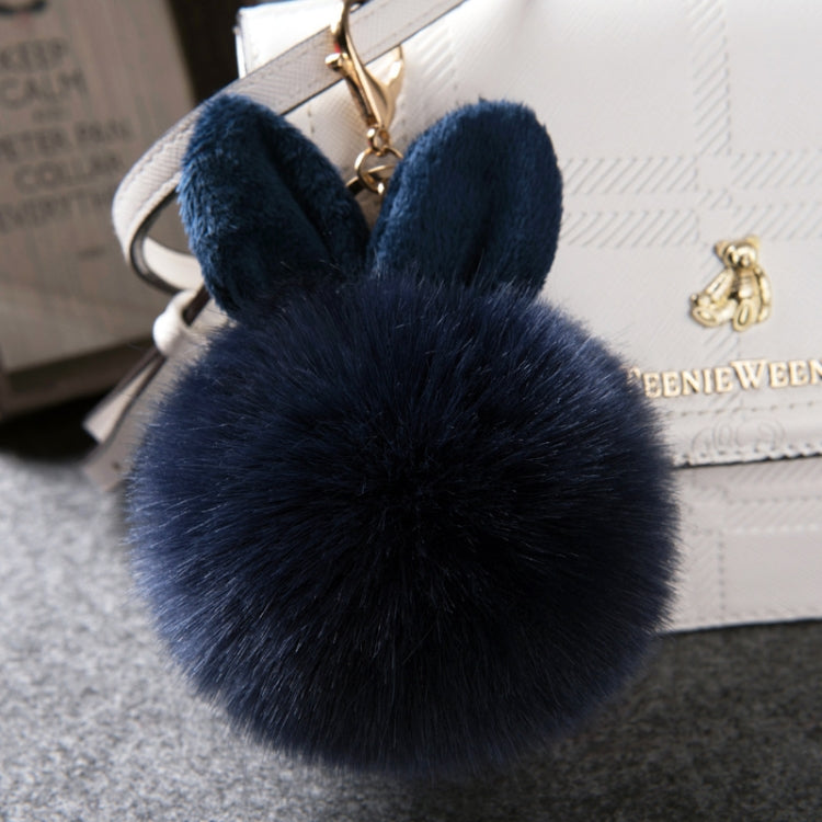 Dark navy faux-fur rabbit pom keychain with long ears and gold-tone clasp