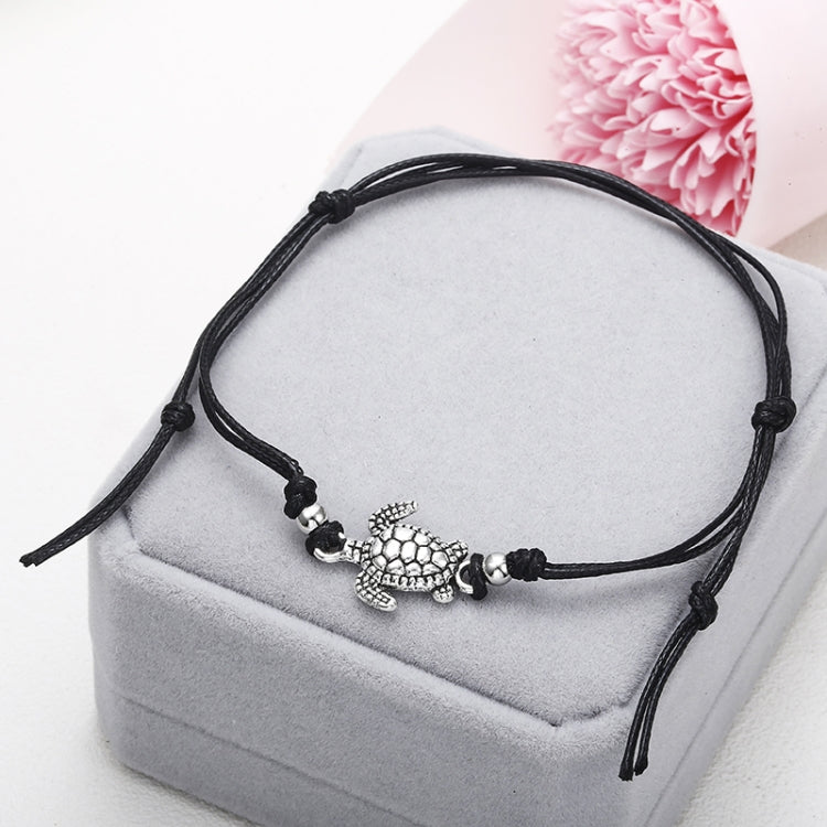 Black wax string sea turtle anklet with bead details and adjustable tie ends