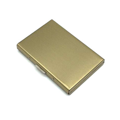 Slim gold metal card holder with hinged snap closure, mirror finish, travel card case