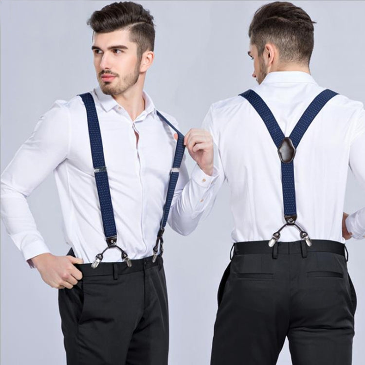 Adjustable trouser suspenders on a man: navy straps with metal clips