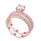Rose gold cubic zirconia wedding ring, angled side view with round center stone