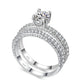 Double row cubic zirconia wedding engagement ring with round halo solitaire