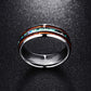 Wide metal band ring with multicolor inlay and glossy black outer edge