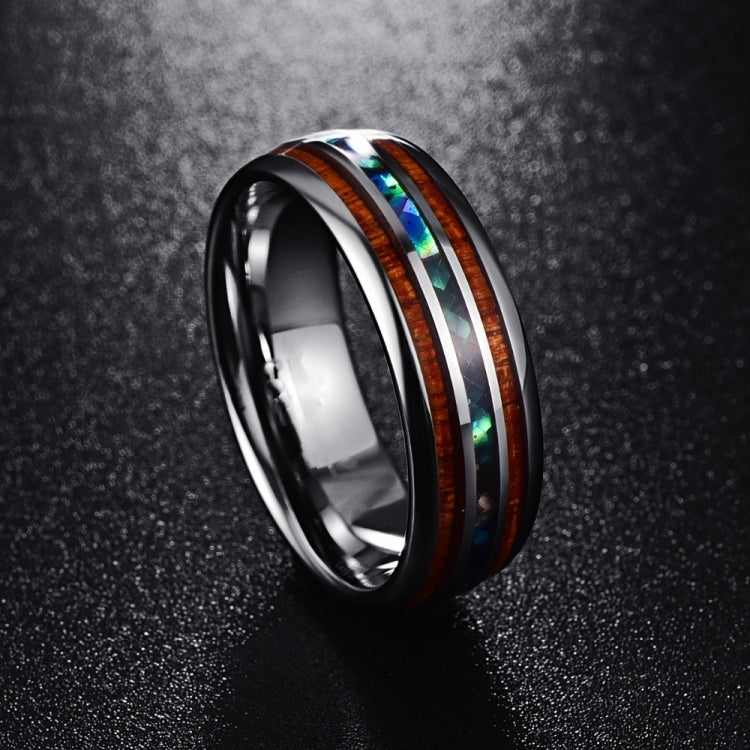 Angled view of metal ring with brown stripe and colorful opal-like inlay