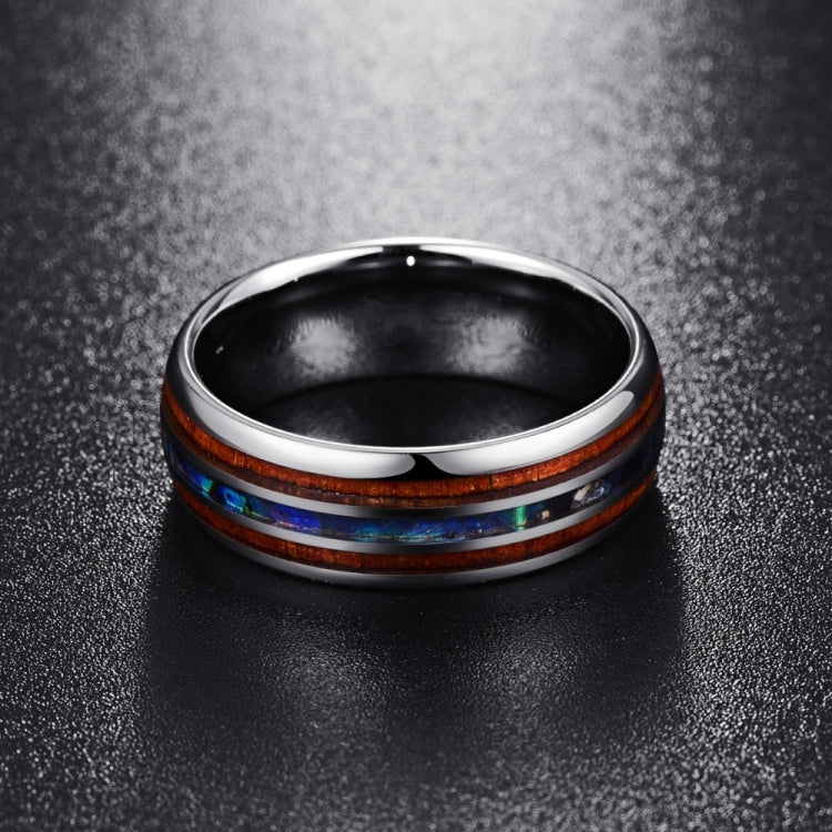 Top view of metal ring with multicolor inlay and brown outer stripe