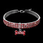 Red rhinestone dog collar with silver buckle and hanging crystal bone charm for small dogs