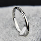 Silver and black stainless steel ring with glossy finish and smooth band
