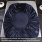 Navy silk-look fitted sheet with elastic surround shown from above on a flat sheet