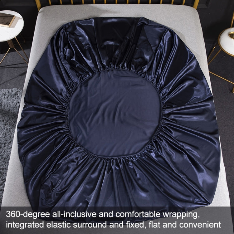 Navy silk-look fitted sheet with elastic surround shown from above on a flat sheet
