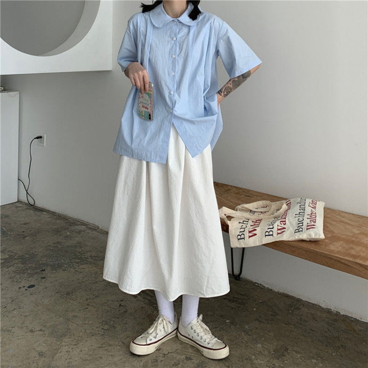 White high-waist A-line midi skirt with loose drape and full flare
