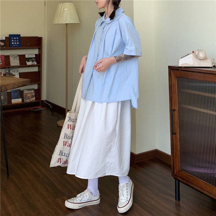 White high-waist A-line midi skirt shown from the side