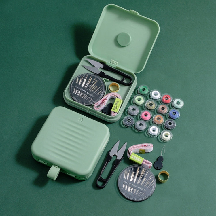 Magnetic sewing storage box, mint green, open case with spools and scissors