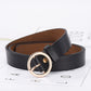 Black PU waist belt with round gold-tone buckle and inner tan lining