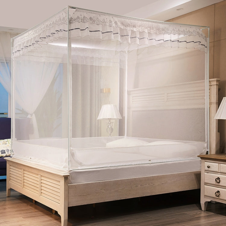 White full-bed mosquito net enclosure with sheer mesh sides and scalloped valance trim