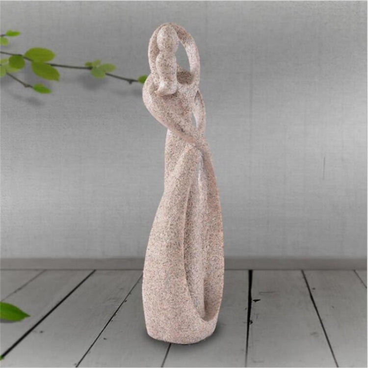 Sandstone cameo statue of a standing abstract love figure, textured beige stone finish.