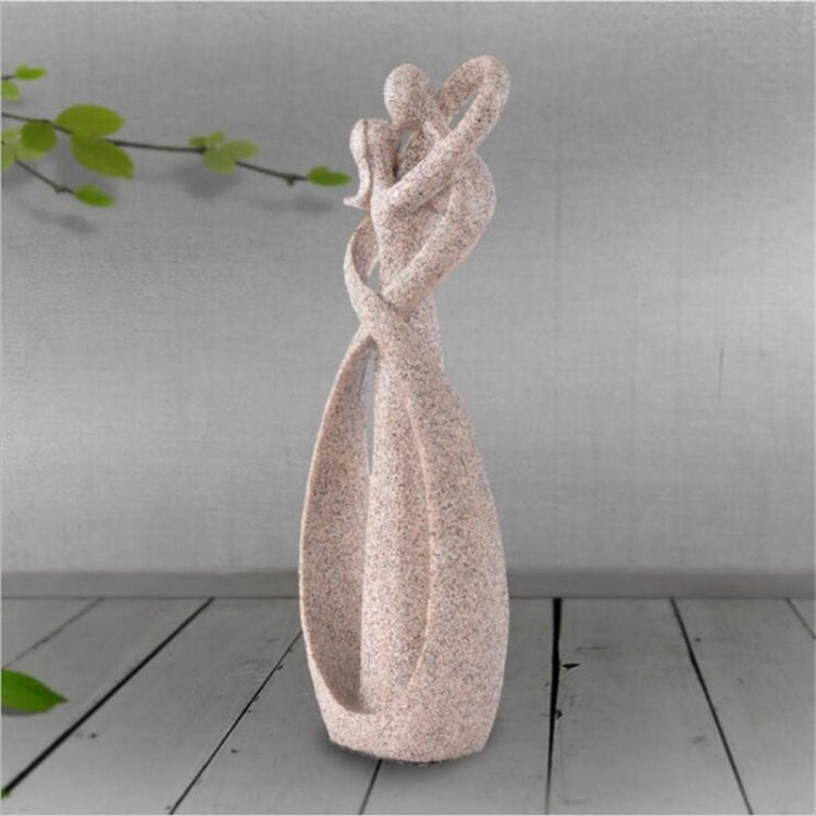 Sandstone cameo statue with heart-shaped top, textured beige stone love figure.
