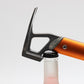 Close-up of orange tent stake mallet with claw head and frosted metal handle