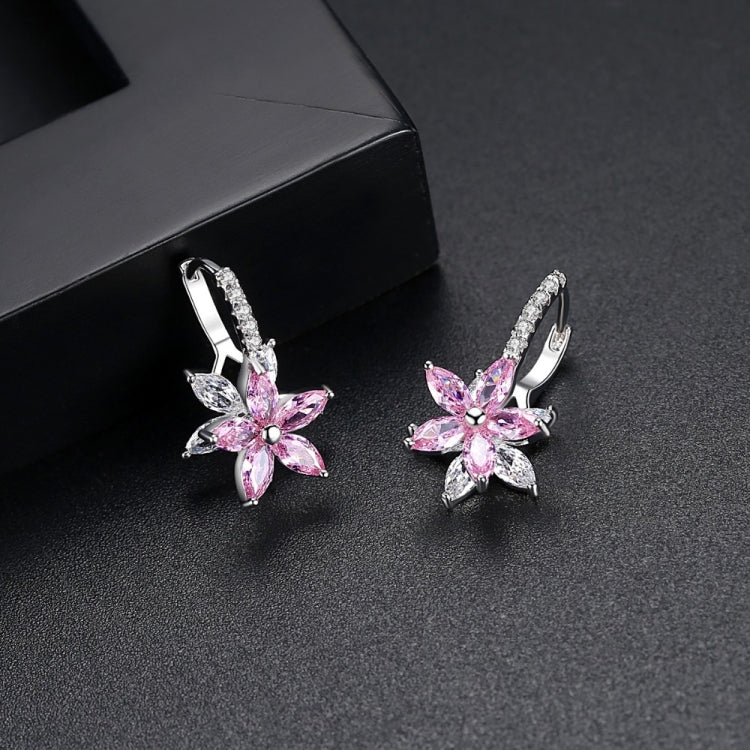 Pink and clear flower-shaped cubic zirconia stud earrings with silver-tone hoops