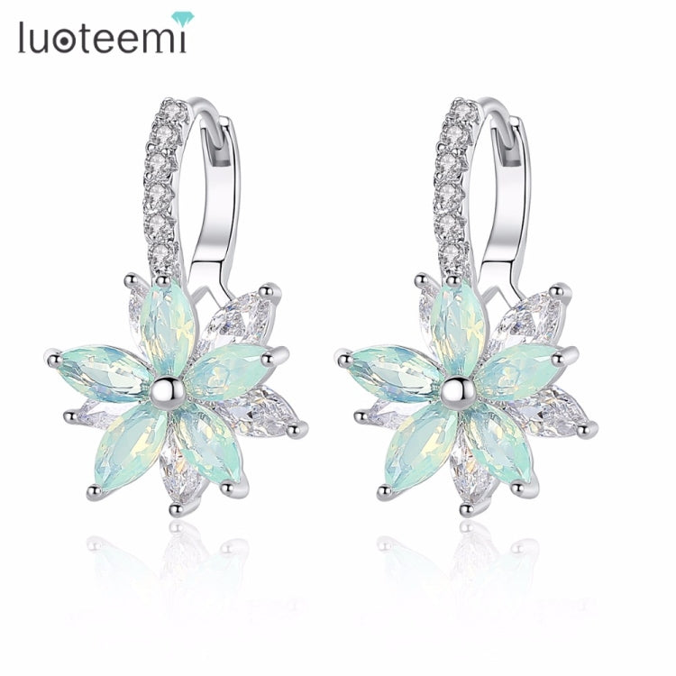 Pastel light blue flower-shaped cubic zirconia stud earrings with silver-tone hoops