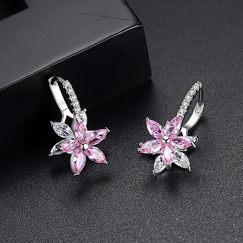 Pink flower stud earrings with clear cubic zirconia petals and hoop-like hinge backs