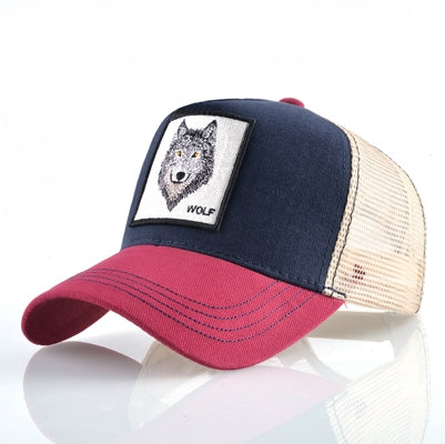 Embroidered animal baseball cap, navy front with wolf patch, tan and burgundy brim
