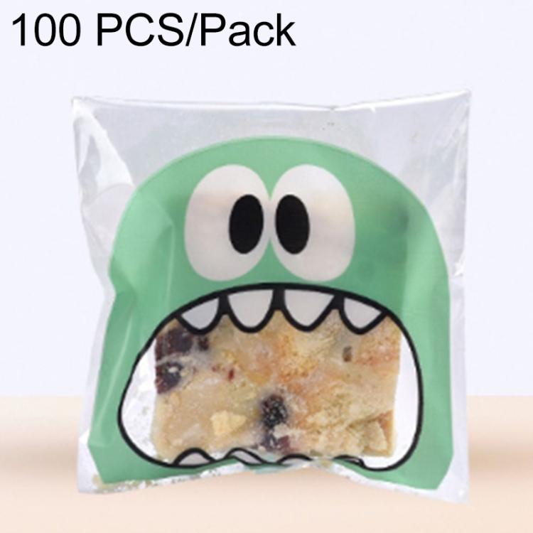 Green monster-mouth cookie gift plastic bag with printed face and pastry inside