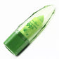 Aloe vera lip balm bullet, clear green tube with green base in angled close-up
