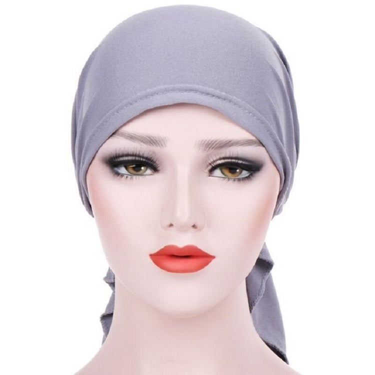 Light gray curved wrap cap turban hat with long side tie tail, snug headband fit