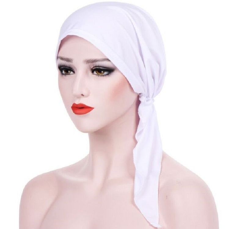 White curved wrap cap turban hat with side knot and long trailing tie