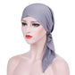 Gray curved wrap cap turban hat with side knot and angled hanging tie tail