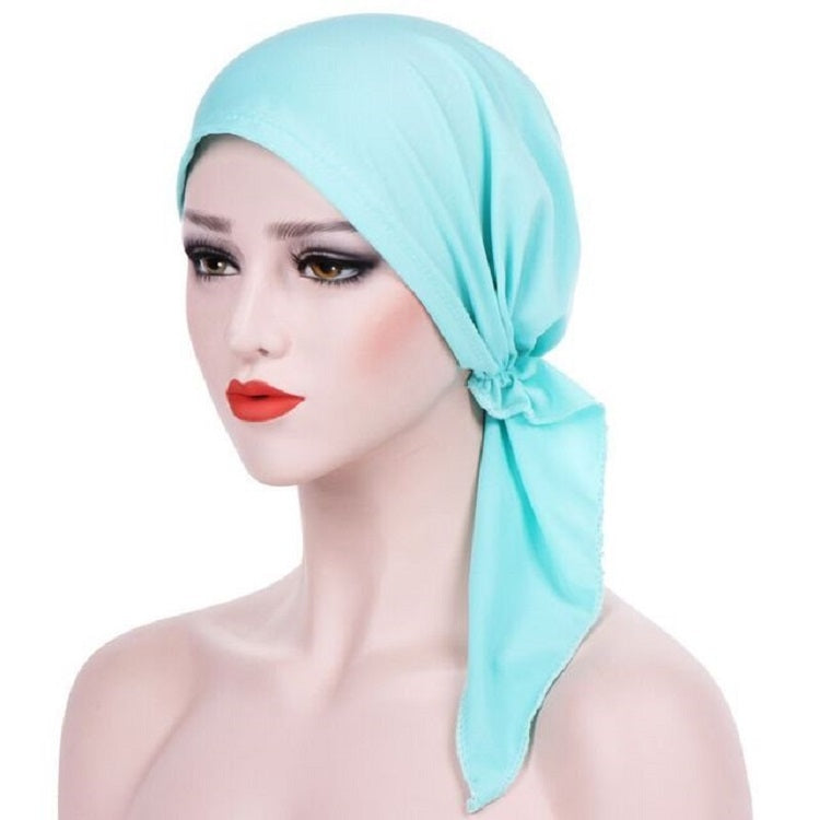 Curved two-tail wrap turban hat in light blue, tied back tail