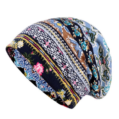 Rolled cotton hat wrap with multicolor tribal print on blue fabric