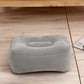 Gray inflatable foot rest pillow, front view with cup opening