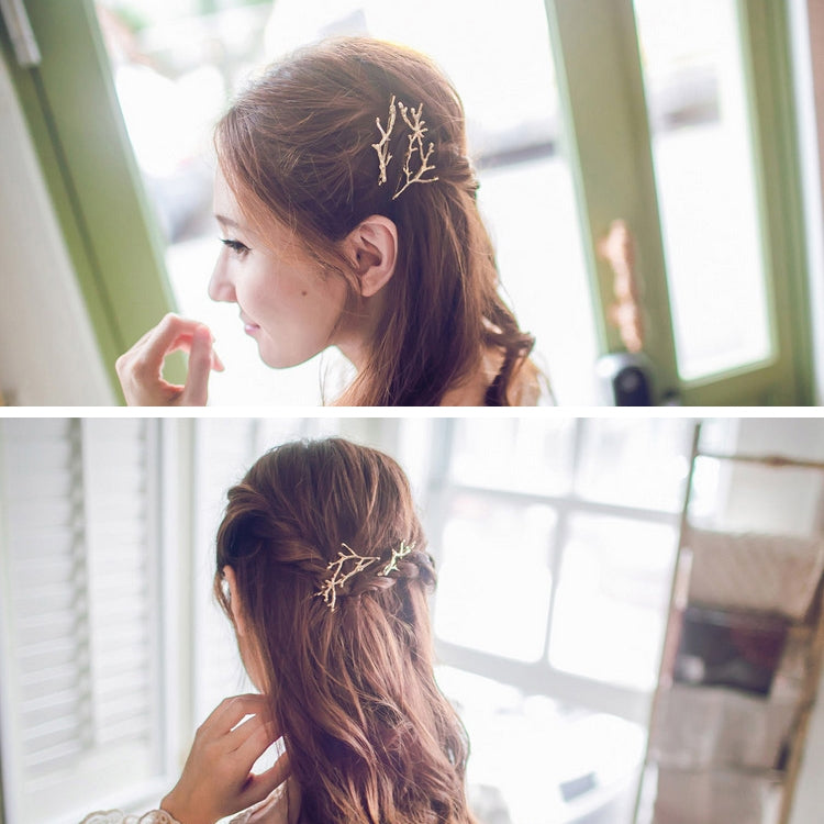 Gold tree-branch hair clip on girl's hair, decorative branch bobby pin