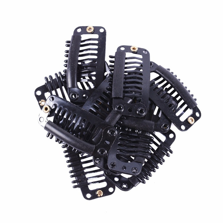 Bundle of black 9-tooth hair extension snap clips with silicone backing, metal combs