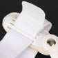 Close-up of white big toe splint hinge with round metal button and molded plate