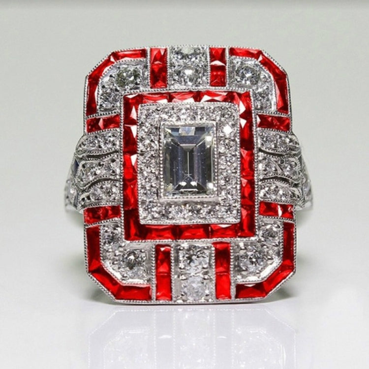 Square crystal zircon engagement ring with red accents and clear center stone