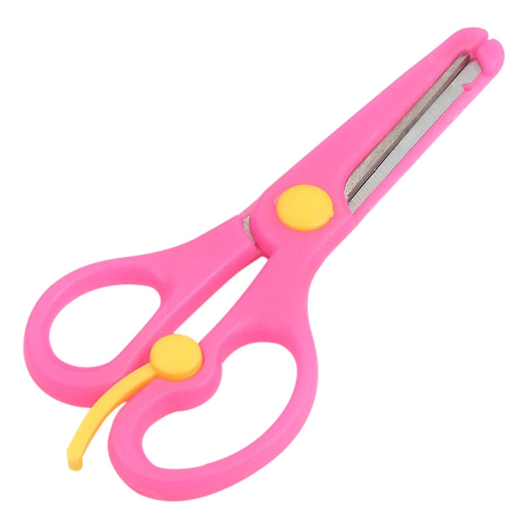 Pink safety scissors with yellow accents and rounded tips, ergonomic loop handles