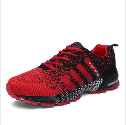 Red and black breathable trekking sneakers with lace-up front and rubber grip sole