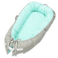 Baby nest bed with aqua triangle inner and gray chevron edge, light mint and gray ties