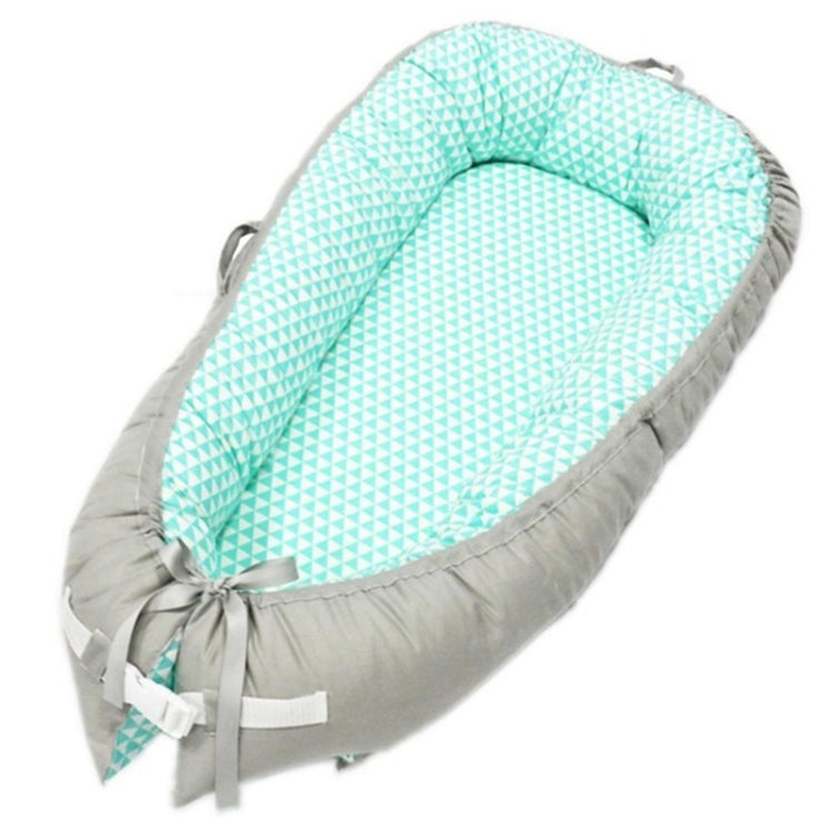Baby nest bed with aqua triangle inner and gray chevron edge, light mint and gray ties