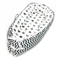 Baby nest bed with vehicle print inner and black chevron outer, white base with dark accents