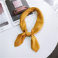 Solid-color satin square scarf with long tied bow, golden yellow
