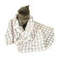 Pet flannel blanket draped on cat, pastel multi-color dot pattern