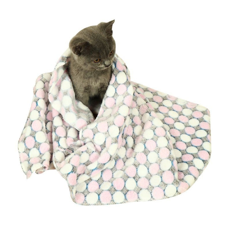 Pet flannel blanket draped on cat, pastel multi-color dot pattern