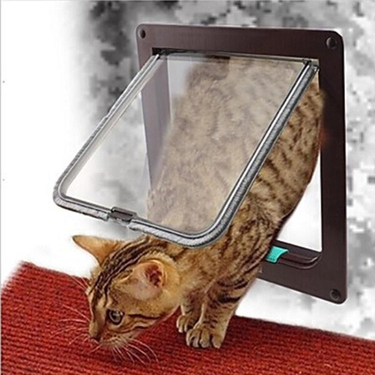 Lockable pet door with clear flap and dark brown frame; cat is using the opening