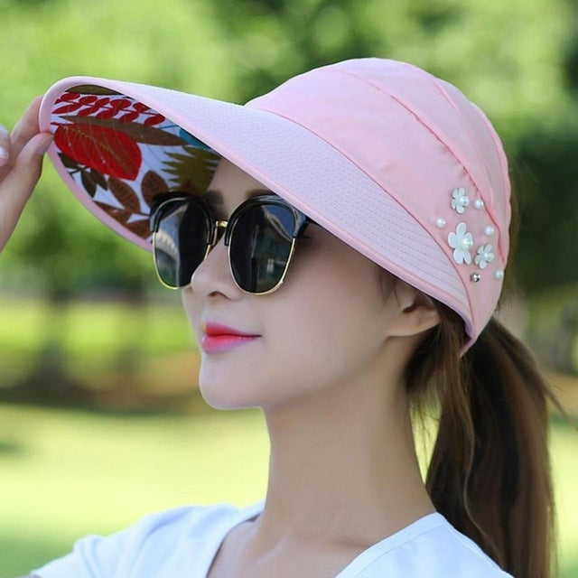 Women's wide-brim sun hat, pale pink with white flower applique and studs